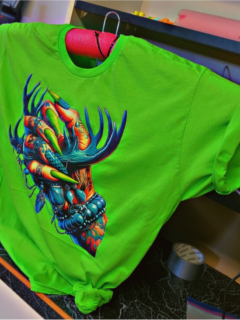 Neon Green Graphic Tee with Colorful Hand & Antler Art